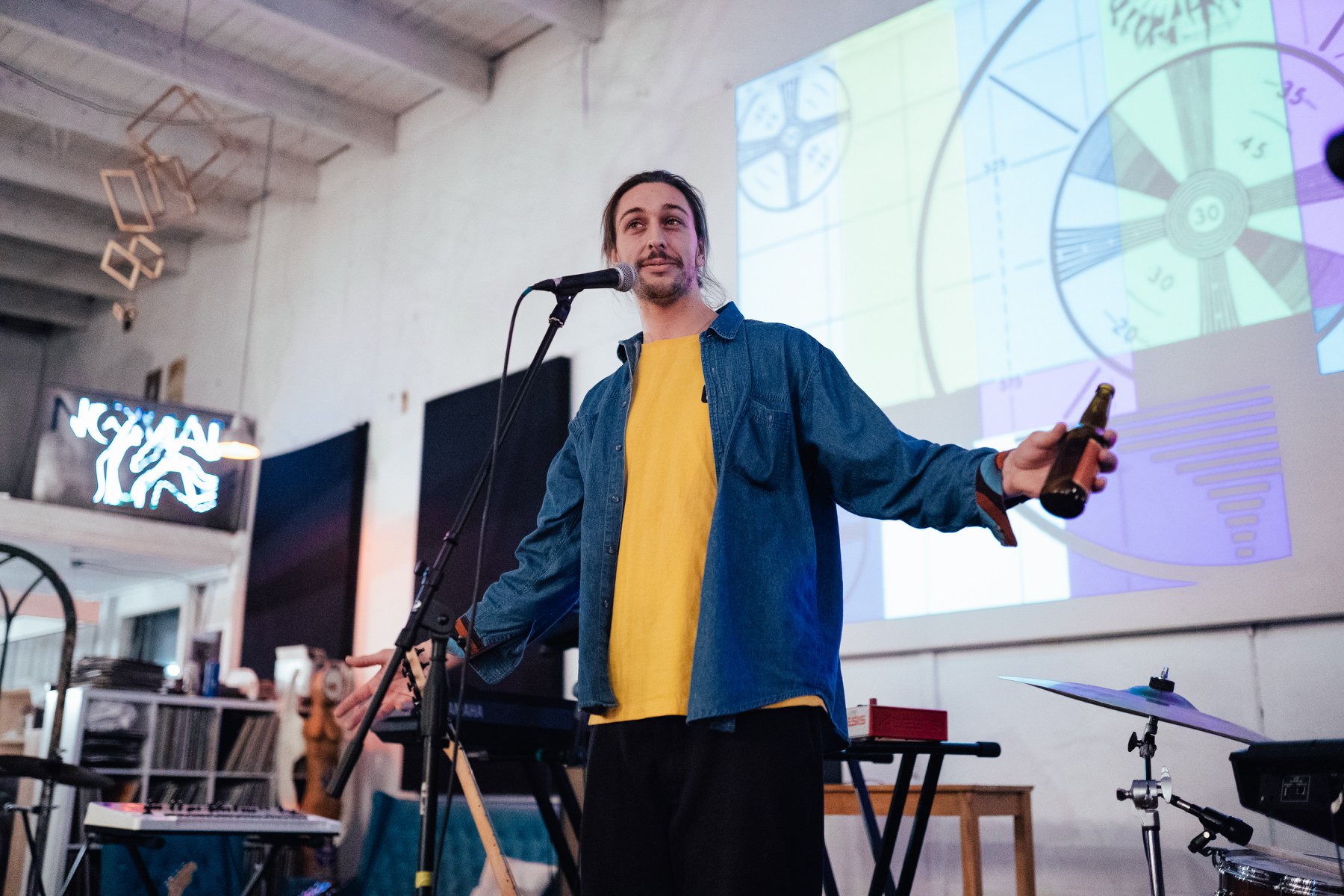 Mat Turner on stage right before the projection.